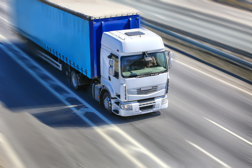 big powerful truck moves on highway